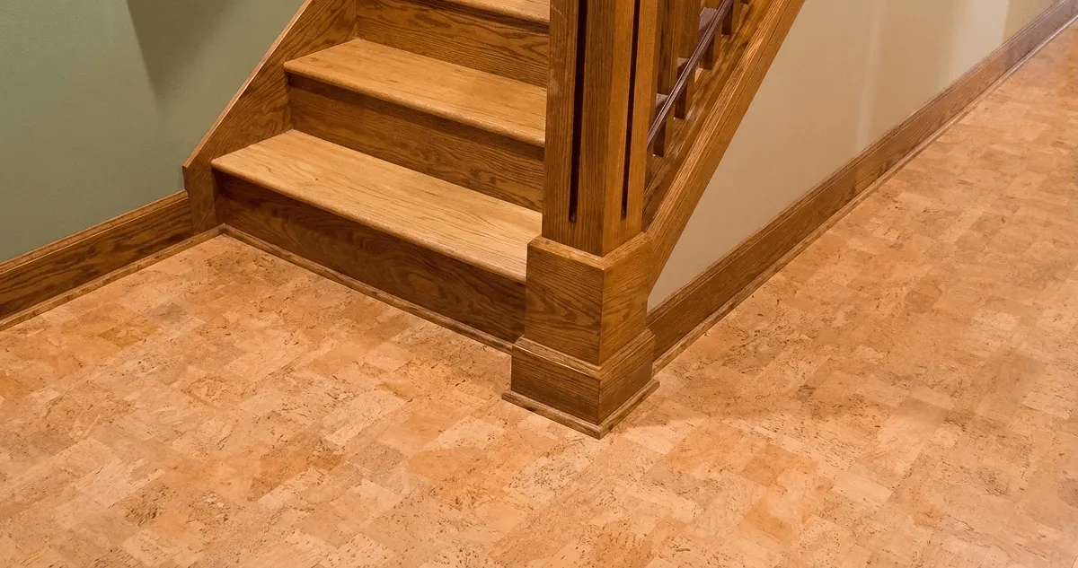 End of a staircase with cork flooring in Jackson, MS